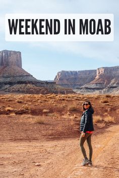 a woman standing in the middle of a dirt road with mountains in the background and text overlay that reads weekend in moab