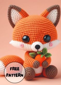 a crocheted fox with a carrot on it's lap and the words free pattern below