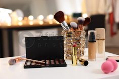 Different cosmetic products on white table in makeup room Glamour Home, Dressing Table Mirror, Makeup Room, Luxury Makeup, White Table, Clothing Rack, Makeup Cosmetics, Stock Photography