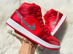 Bling Nike Air Jordan 1 Mid Shoes Hand Customized with Genuine Swarovski Crystals Colors: Patent Red & Matte Red w/ White Soles Model and Color Code: #DH5894-600 Note: Box may be missing top lid or shoe box Each and every Swarovski crystal is set by hand with top quality, permanent adhesive. Our products come direct from the manufacturer or authorized retailers, and are 100% authentic. We offer free crystal replacement for life! Should any crystals fall off, simply send your shoes back to us and Glitter Jordans Shoes, Nike Jordans Costom Colorful, Luxury Nike Jordan Shoes With Red Sole, Red Bling Nike Shoes, Luxury Nike Sneakers With Red Sole, Luxury Red Jordan Shoes, Luxury Red Custom Sneakers With Nonskid, Luxury Red Custom Sneakers For Women, Air Jordan 1 Diamond