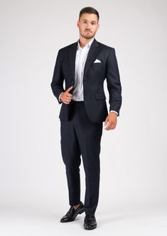 The Astor Dark Navy Twill Suit is an elegant and timeless professional wardrobe staple. Versatile for a variety of occasions, get ready to look your best in this custom made suit, wherever you wear it. Elegant Semi-formal Pantsuit With Pressed Crease, Luxury Fitted Formal Sets, Wedding Three-piece Suit With Welt Pockets, Professional Business Sets, Tailored Elegant Formal Pantsuit, Luxury Tailored Formal Sets, Tailored Elegant Pantsuit For Formal Occasions, Elegant Tailored Pantsuit For Formal Occasions, Tailored Professional Pantsuit For Semi-formal Occasions