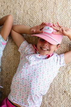 Add a touch of stylish flair to your family’s wardrobe with The Kids Blush Rope Hat. Designed for everyone—kids, men, and women—this pink hat offers both style and function with its 100% polyester material, making it water-resistant and durable. The unstructured design, classic rope detail, and adjustable snap-back closure ensure a comfortable, customizable fit for all ages. With a charming patch on the front, this blush kids hat brings a pop of color to any outfit. Picture your family stepping Pink Snapback Hat For Outdoor Activities, Playful Cotton Outdoor Hat, Pink Outdoor Hat, One Size Fits Most, Boys Golf, Kids Hat, Pink Hat, 4 Way Stretch Fabric, Golf Polo, Back To School Outfits