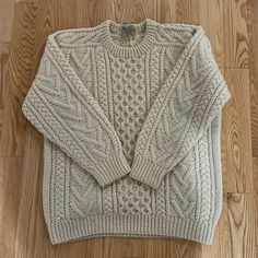 Classic Cable Knit Sweater. From The Ski Hills To Staying Cozy Warm On A Walk On The City Streets. This Is A Classic That Never Goes Out Of Style. Sweater Aesthetic Men, White Sweater Aesthetic, Knitted Sweater Aesthetic, White Knitted Sweater, Sweater Aesthetic, Ski Hill, Aesthetic Men, White Knit Sweater, Men Cream