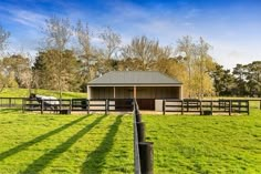 the horse barn is empty and ready to be used as a stable for its horses