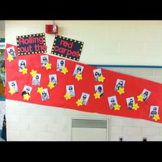 a bulletin board with pictures and stars on it