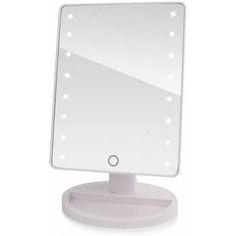 a white lighted mirror on top of a stand