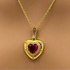 Only One In Stock. Stunning. Bright Gold Tone Metal. Clear Cubic Zirconia Detailing. Red Heart Shaped Zirconia. Necklace Is 18 Inches Red Heart Necklace, Zircon Necklace, Zirconia Necklace, Bright Gold, Gold Tone Metal, Red Heart, Red Gold, Lady In Red, Womens Jewelry Necklace