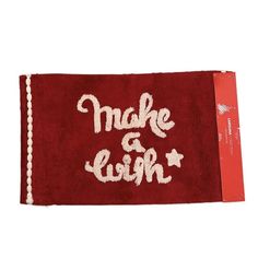 a red towel with the words made in white on it