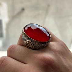 Man Silver Large Ruby Ring , Handmade Ottoman Style Large Ring , Big Red Stone Ring , Zircon Stone Ring , 925k Sterling Silver Ring  ★Item Details * Gender : Male / Female * Material : 925K Sterling Silver * Total weight : 50 Grams * Gemstone : Ruby  Stone ✔ Ready to Ship in 1-2 Business Days .. ✔ Shipped to the Worldwide 1-5 business days with free shipping... ✔ The product will be sent to you with a handmade wooden box to avoid any damage during shipping... ✔ Visit our store, browse other Men' Collectible Red Engraved Ring, Red Engraved Ring Gift, Heirloom Style Red Gemstone Signet Ring, Heirloom Style Red Signet Ring With Gemstone, Heirloom Red Signet Ring With Gemstone, Heirloom Red Gemstone Signet Ring, Antique Red Gemstone Signet Ring, Antique Red Rings For Gifts, Red Oval Engraved Ring With Polished Finish