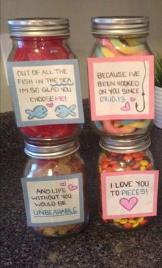 three jars filled with different types of candy