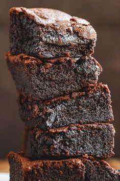 chocolate brownies stacked on top of each other