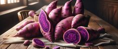 a group of purple vegetables sitting on top of a wooden table