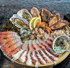 a basket filled with lots of different types of seafood