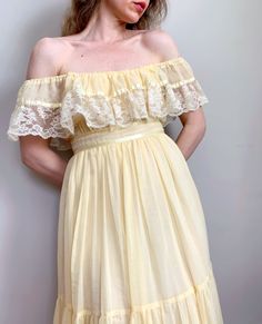 "DETAILS -pastel yellow with satin ribbon and lace detailing  -elastic neckline for an on or off-the-shoulder look (both styles are shown in photos) -zipper down back -tie back -maxi length -full sweep  -fully lined  -material is thin, lightweight, and somewhat see-through -fabric is made up of voile (polyester & cotton) with an acetate lining -brand is \"Gunne Sax by Jessica\" -tag reads size 9 SIZE & FIT [would best fit a size x-small to small] -32\" bust (can stretch up to a 36\" bust when pulled tight across) -26\" waist -52\" length [model is 5'8\", size x-small to small] CONDITION [item has been gently hand-washed] PLEASE READ FULLY! -some staining in places, but MOST NOTICEABLY are some faint black marks below the zipper placket and on the tie -elastic has been stretched out some an Cottage Dress, Big Girl Dresses, Cute Formal Dresses, Sax Dress, Gunne Sax Dress, Vintage Maxi Dress, Prairie Dress, Gunne Sax, Pastel Yellow