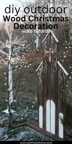 an outdoor christmas decoration with snow on the ground and trees in the background, text overlay reads diy outdoor wood christmas decoration video