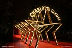 a lighted sign that says charlotte the star