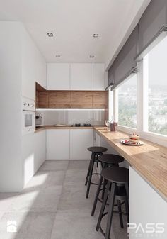 an image of a kitchen with white cabinets and counter tops on instagram for sale