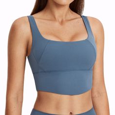 PRICES MAY VARY. 78% Polyamide, 22% Elastane Imported Hug You like a Cloud: Workout tops for women made of buttery soft, breathable, lightweight, 4-way stretch and sweat-wicking fabric keep you dry and all-day comfort, NON SEE-THROUGH. U-neck & Arc-shaped Bottom: With U-neck, these sports bra show your sexy neck and collarbone naturally, and can be worn under regular clothes. Cute arc-shaped bottom beautifies your waist for a slim and sexy look, won't roll up. All-in-one Design: Removable pads for easy adjustment and won’t get loose after washing. Non see-through built in bra and stretchy straps hold the girls in place with enough coverage and support. Versatile Crop Tops: Longline design, padded for extra coverage and support, these workout crop tops are ideal for workout, yoga, pilates, Tops With Built In Bras, Crop Tops For Women, Bra For Women, Workout Tops For Women, Women Workout, Sport Bra Top, Workout Crop Top, Padded Sports Bra, Gym Yoga