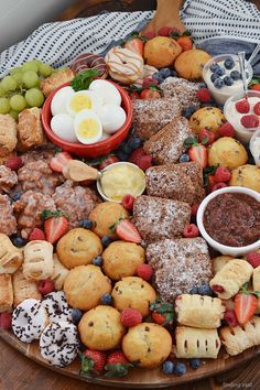 a platter filled with desserts and pastries