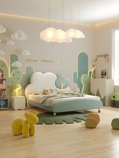 a child's bedroom with cactus themed wallpaper and wooden flooring, including a large bed