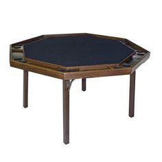 a table with a black top and wooden legs