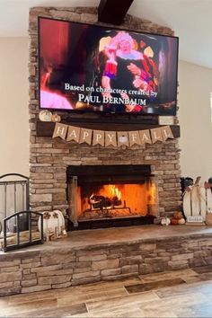 a fireplace with a large television above it