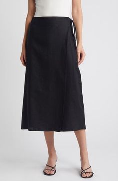 A delicate string tie secures the wrapped silhouette of a classic black midi skirt cut from breezy linen. 32 1/2" length (size Medium) True wrap style with side tie closure Unlined 100% linen Dry clean Imported Elegant Linen Bottoms With Tie Waist, Elegant Linen Wrap Skirt, Wrap Midi Skirt, Summer Wardrobe Essentials, Tulip Skirt, Black Midi Skirt, Black Midi, Made Clothing, Comfortable Dress