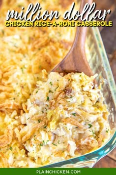 chicken rice casserole in a glass dish with a wooden spoon on the side