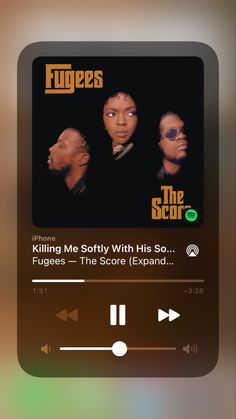 an mp3 player with the text fugees on it's screen and two people in