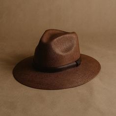 "The Sandoval Puebla hat is a stylish and elegant hat that is perfect for any occasion. It features a stiff brim that helps to keep its shape, and an internal band for a better fit. The paper straw construction is both durable and lightweight, making it ideal for all seasons. The brown color is timeless and will complement any outfit. * Handmade in México * Made from natural materials * 5-star rated model * Etsy's pick: selected by Etsy's style and trend editors SIZES Medium (M) = head circumference of 56 - 58.5cm Large (L) = head circumference of 58.5 - 60cm HOW DO I KNOW MY SIZE Discover your size with a measurement tape. Position the tape above your ears and exactly around your head where you want to wear the hat's brim. DIMENSIONS Brim: 8cm / 3.15\" inch Crown: 11cm / 4.33\" inch ONE-S Elegant Solid Straw Hat With Short Brim, Fitted Wide Brim Hat, Brown Fedora With Short Brim, Brown Brimmed Straw Hat, Fitted Solid Color Brimmed Panama Hat, Fitted Brown Straw Hat With Short Brim, Chic Solid Brimmed Panama Hat, Brown Wide Brim Fitted Hat, Brown Straw Hat With Curved Brim