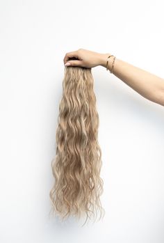 Waved by Laced Hair Extensions Waved by Laced Hair Extensions brings your client summery beach waves all year long! These extensions air dry gorgeously, with a gentle wave, and can be enhanced with a diffuser and curl products. These versatile extensions can bring any look you desire, with the flexibility to be styled straight, blown out, or curled. Waved by Laced Hair Extensions best match clients with wavy hair or soft natural curls. About our Hand Tied Wefts Just like our regular Hand Tied We Laced Hair Extensions, Hand Tied Wefts, Hair Tape, Hair Extensions Best, Lace Hair, Remy Hair, Natural Curls, Hair Health, Wavy Hair