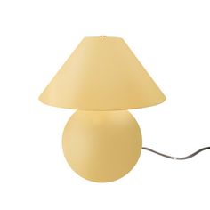 a lamp that is on top of a white surface with a cord attached to it