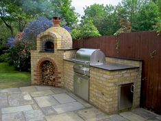 an outdoor brick pizza oven in a backyard