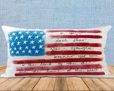 an american flag pillow with writing on it