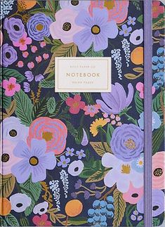 a notebook with flowers on it and the words, note book written in white writing