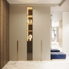 an open closet in a modern home with marble flooring and walls that have vertical blinds on them