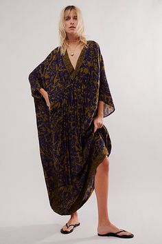 Billowy and breezy, vibrant and eye-catching, this so special kaftan is perfect for brunches, beach days, and everything in between. **Fit:** Maxi length, relaxed and oversized **Features:** Super mod, retro print, relaxed sleeves, pull-on style, deep-v neckline, ruched detailing, soft comfy fabrication **Why We | Groovy Baby Maxi Kaftan Dress by Free People in Purple Chic Dinner Outfit, Garden Snake, Silk Kaftan Dress, Witchy Dress, Kaftan Pattern, Animal Print Maxi Dresses, Maxi Kaftan, Boho Festival Fashion, Stylish Summer Outfits