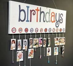 a birthday sign hanging from the side of a wall next to photos and magnets