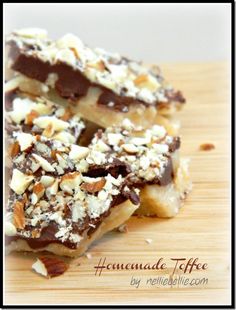 three pieces of chocolate and nuts on top of a wooden cutting board with text overlay that reads homemade toffee