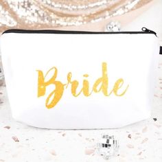 a white bag with the word bride painted on it