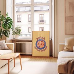 a living room filled with furniture and a large poster on the wall next to a window