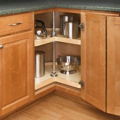 an open kitchen cabinet with the words kitchen organization on it's bottom corner in white