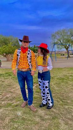 two people dressed up as toy story characters