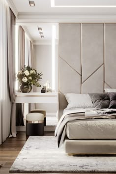 a bedroom with a large bed and white walls