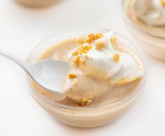 an ice cream dessert in a plastic bowl with a spoon