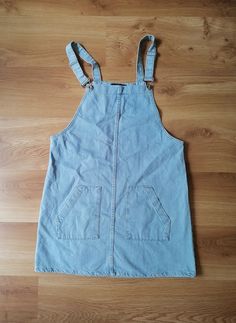 Vintage denim overall dress , mini denim onepiece M-L Waist: 100 cm/ 41 in Hips: 112 cm / 44 in Lenght: 90 cm/ 35 in Materials: 100% cotton Condition: very good vintage condition Defects: none See more like this in my shop: https://www.etsy.com/shop/VintageInsparation?ref=seller-platform-mcnav ---------------------------- Be welcome to visit my other Etsy shop for handmade upcycled clothes and bags: https://www.etsy.com/shop/ArtAnnByBoutique?ref=profile_header Denim Onepiece, Womens Overalls, Upcycled Clothes, Denim Overall Dress, Profile Header, Overalls Women, Dress Mini, Overall Dress, Upcycle Clothes