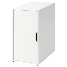 a white cabinet with a black hole in the front and one door open on top