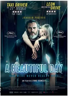 a movie poster for a beautiful day with two people hugging and the words, you were never really here