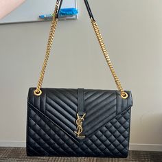 Authentic Large Envelope Bag In Noir. Purchased 4/24/2022 At Ysl In Store, Can Show Proof Of Purchase. Excellent Condition. Ysl Black Large Bag, Yves Saint Laurent Bag, Noir Color, Large Envelope, Saint Laurent Bags, Yves Saint Laurent Bags, Envelope Bag, Saint Laurent Bag, Chanel Classic