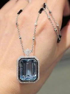 Main Stone Onyx - Cubic Zirconia. Main Stone Color Aqua, White. Style With Diamonds & Gemstones. Total Carat Weight 2.00 - 4.99 ct Approx. قلادات متدلية, Emerald Cut Halo, Bijoux Art Nouveau, Blue Emerald, Halo Pendant, Deco Jewelry, Gorgeous Jewelry